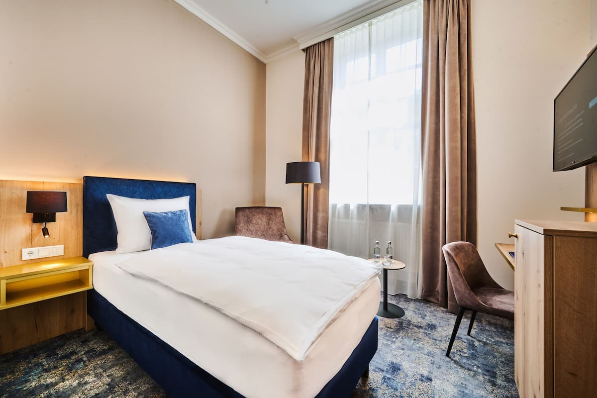 Superior eenpersoonskamer, 1 eenpersoonsbed, privébadkamer | 1 slaapkamer, luxe beddengoed, donzen dekbedden, een minibar