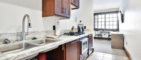 Microwave, stovetop, dishwasher, coffee/tea maker