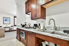 Microwave, stovetop, dishwasher, coffee/tea maker