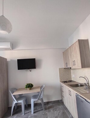 Chambre Quadruple, vue mer | Cuisine privée | Lave-vaisselle