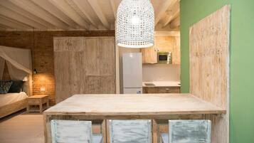 Superior Apartment | Private kitchen | Electric kettle, cleaning supplies