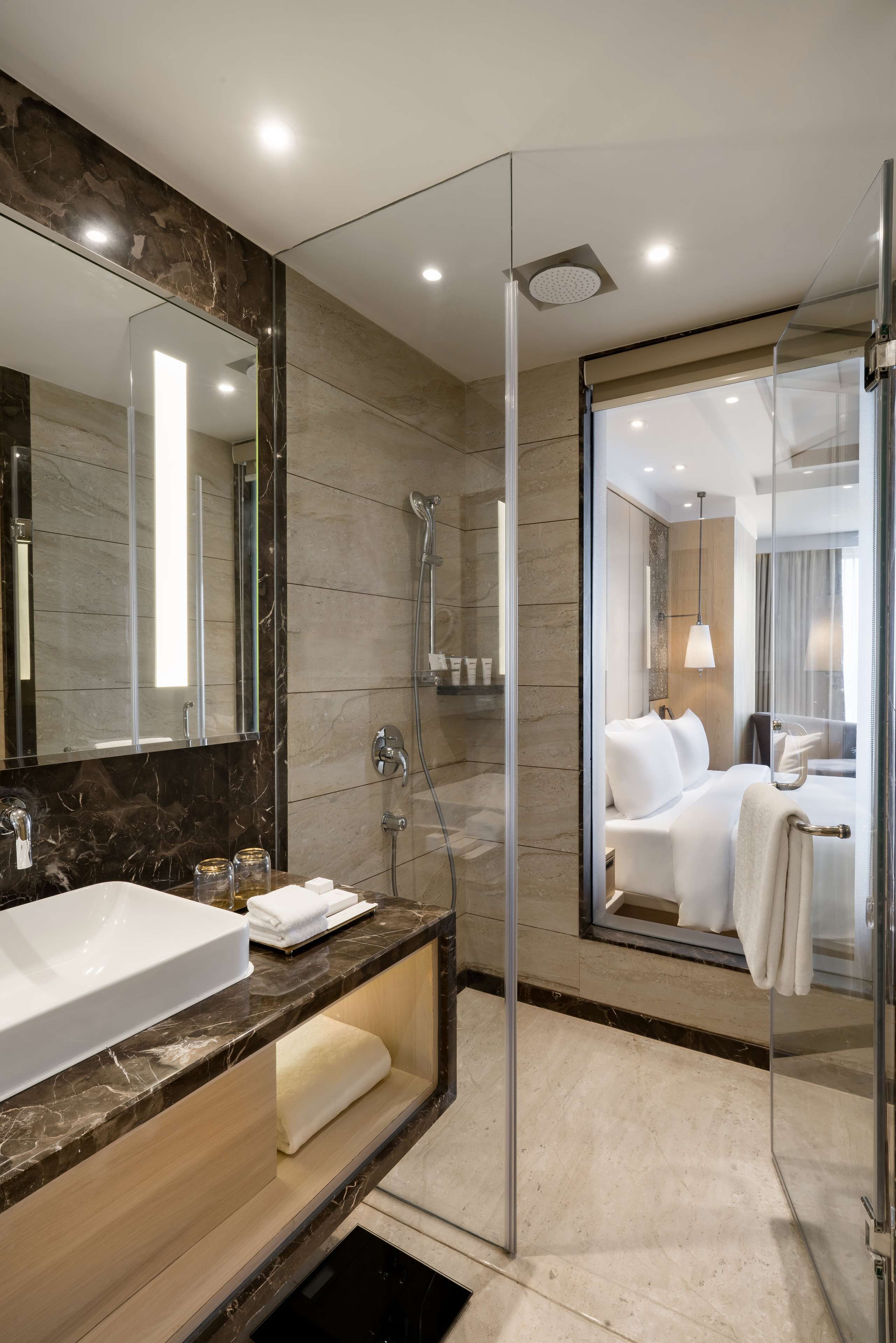Rainfall showerhead, eco-friendly toiletries, hair dryer, bathrobes