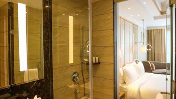 Superior Room | Bathroom | Rainfall showerhead, eco-friendly toiletries, hair dryer, bathrobes