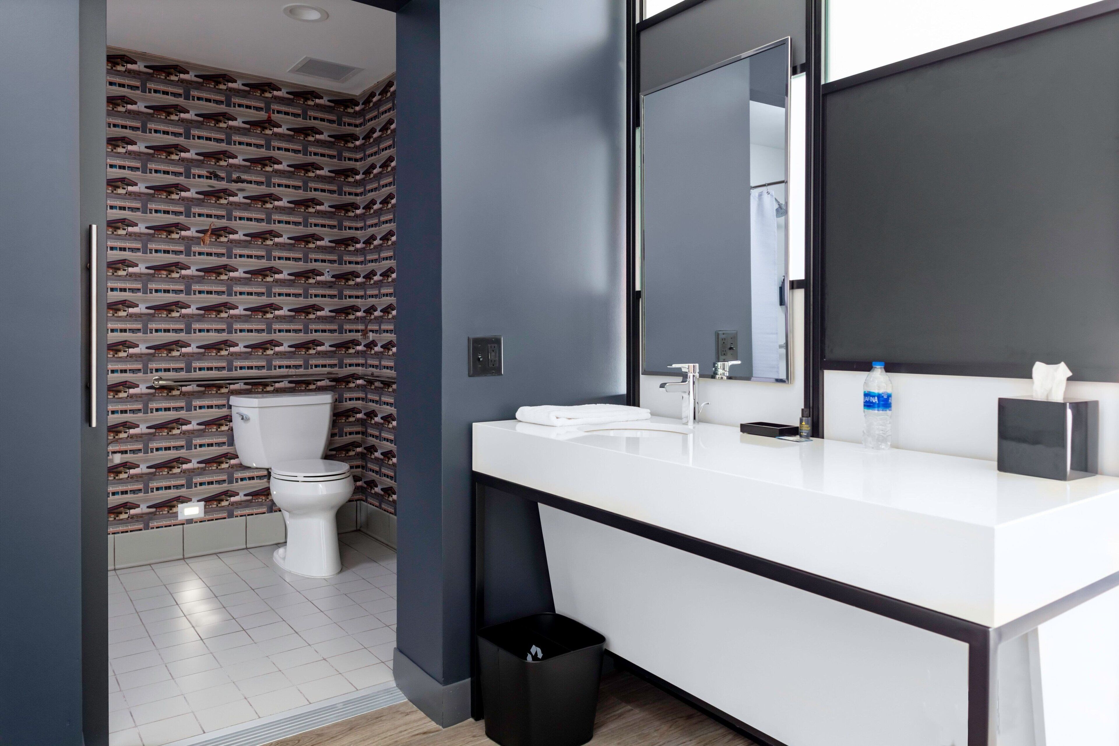 shower, rainfall showerhead, designer toiletries, hair dryer