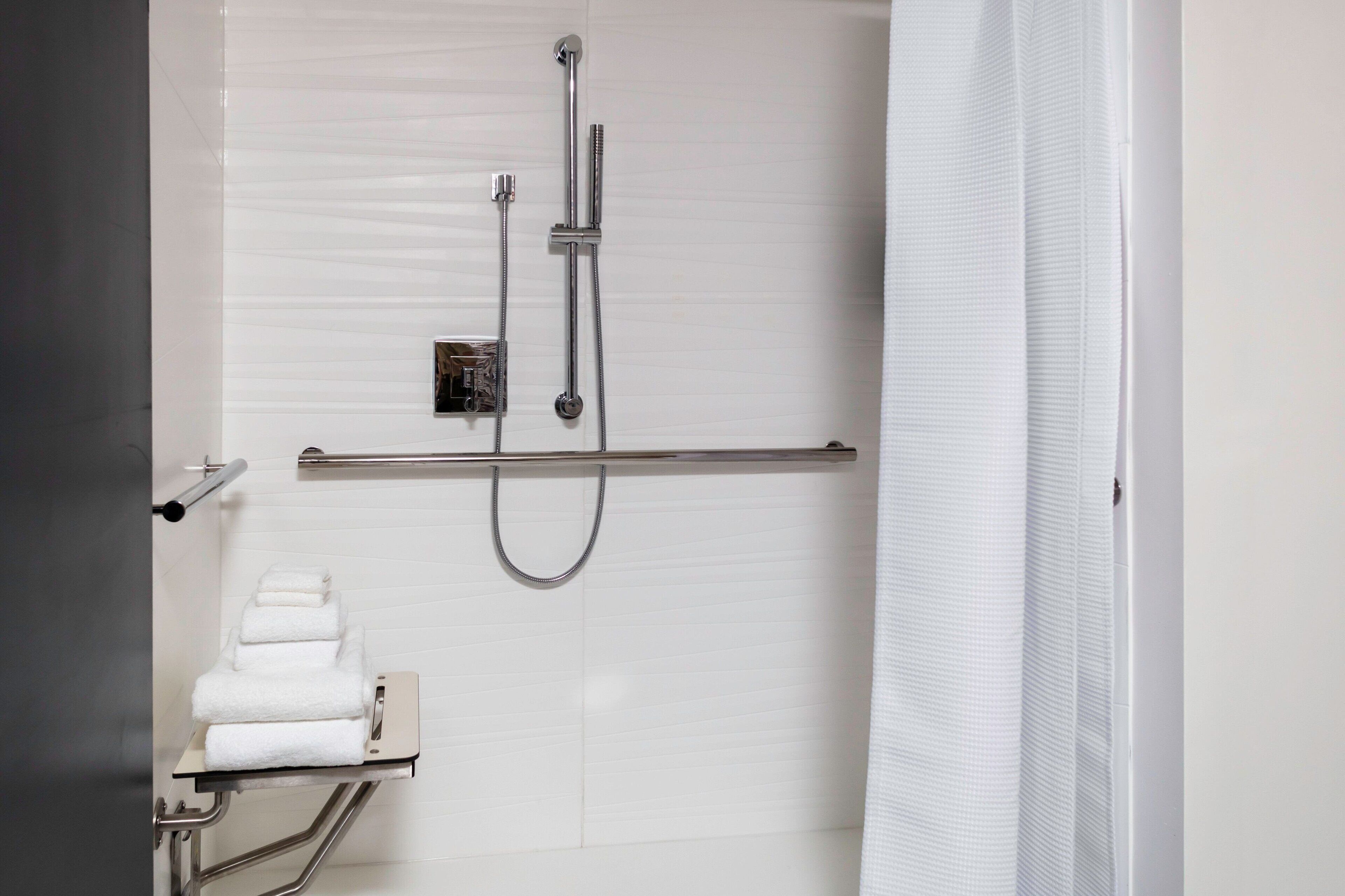 shower, rainfall showerhead, designer toiletries, hair dryer