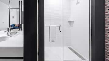 Designer toiletries, hair dryer, towels, soap
