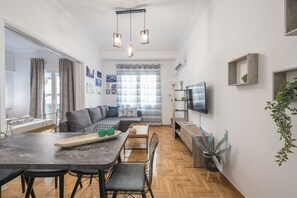 City Apartment | Living area | 41-inch flat-screen TV with satellite channels, TV - Athens Bright Suite by Cloudkeys (Athens)