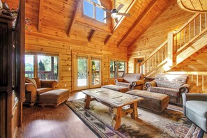 Flat-screen TV, fireplace, foosball, books