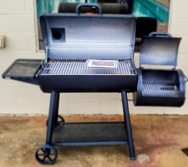 A portable barbecue grill with a side shelf and a foldable lid. - **PRIVATE PROPERTY** Olympic Pool, Tennis, B-ball, Pavilion, NEWLY RENOVATED (+) (Loganville)