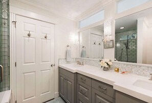 Shower, jetted tub, hair dryer, towels