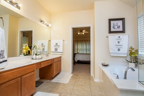 Bathtub, hair dryer, towels, soap