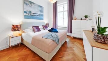 1 bedroom, desk, iron/ironing board, travel crib