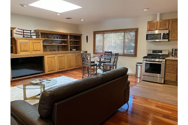 Entry view of great room, kitchen and dining area..