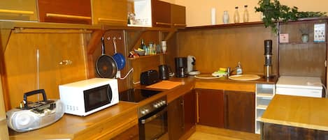 Fridge, microwave, stovetop, coffee/tea maker