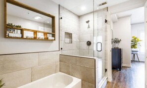 Bathtub, hair dryer, towels, soap