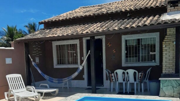 Unclassified image, 1 of 56, button - House with pool, barbecue, 250 meters from the beach (cabo frio)