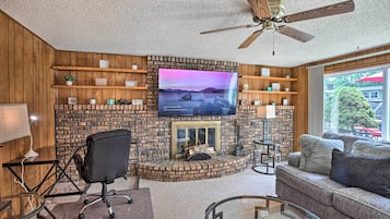 TV, fireplace, books, offices