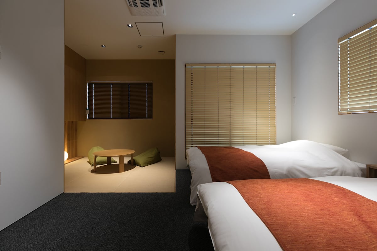 Design Triple Room, Non Smoking | Ruang tamu | TV, lantai dipanaskan