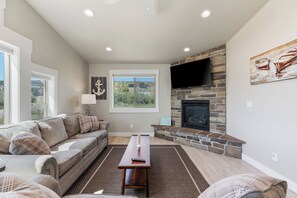 Smart TV, fireplace, DVD player, foosball