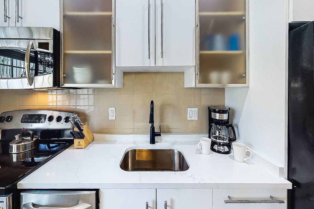 Remodeled and updated kitchen...new solid stone counters and brand new cabinets.