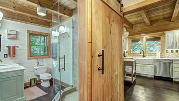 Combined shower/tub, hair dryer, towels, soap