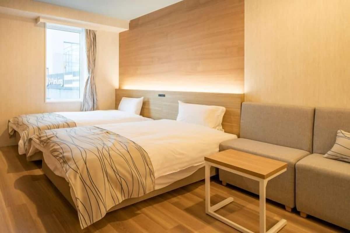 Desk, blackout curtains, soundproofing, free WiFi