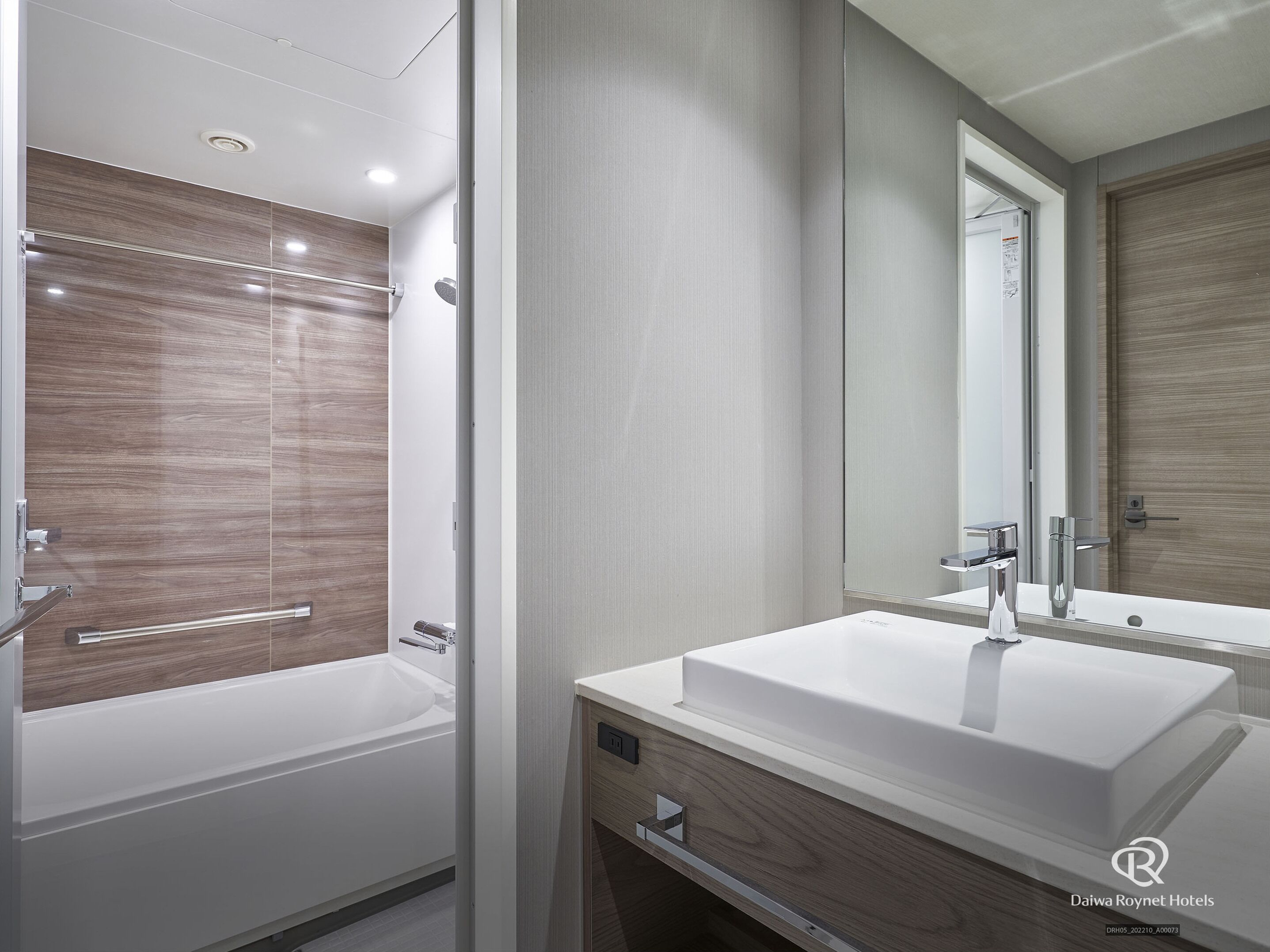 separate bathtub and shower, free toiletries, hair dryer, slippers