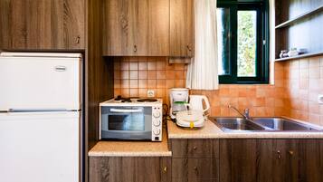 Fridge, toaster oven, cookware/dishes/utensils