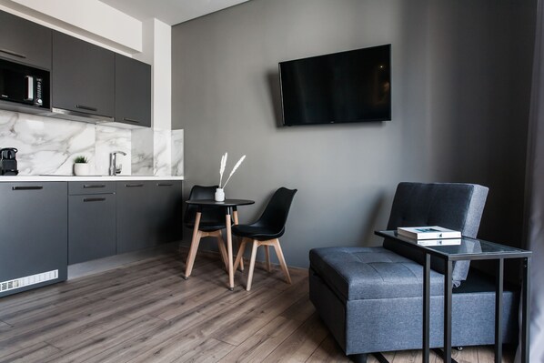 Apartment, 1 Bedroom (C1) | Living area | 42-inch Smart TV with digital channels, TV, Netflix