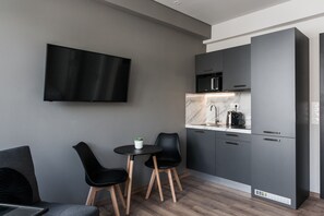Apartment (A2) | Living area | 42-inch Smart TV with digital channels, TV, Netflix