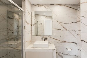 Shower, free toiletries, hair dryer, towels