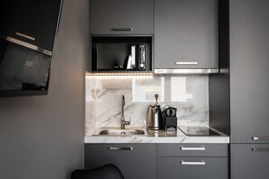 Apartment (A2) | Private kitchen | Microwave, stovetop, espresso maker, electric kettle