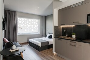 Apartment, 1 Bedroom (B4) | Desk, iron/ironing board, cribs/infant beds, bed sheets