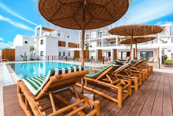 Outdoor pool, pool umbrellas, pool loungers