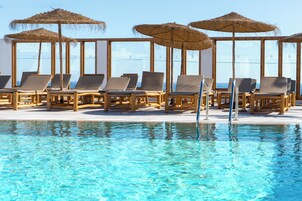 Outdoor pool, pool umbrellas, sun loungers