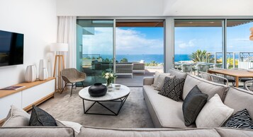 Premium bedding, down comforters, pillowtop beds, in-room safe