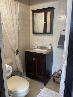 Shower, towels, soap, shampoo