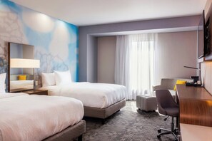 Chambre, plusieurs lits