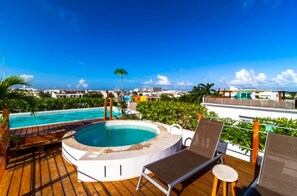 Outdoor pool, a rooftop pool, sun loungers