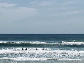 On the beach, sun loungers, beach towels