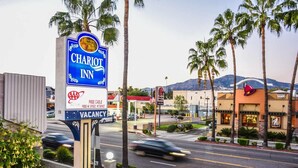 A hotel sign with a blue and white color scheme, indicating a Marriott brand. - 1KNS-1 King Non Smoking (Glendale)