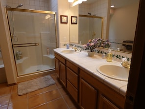 Combined shower/tub, hair dryer, towels, soap