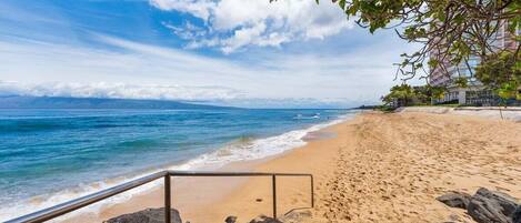 On the beach, sun-loungers, beach towels