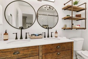 Combined shower/bathtub, hair dryer, towels, soap