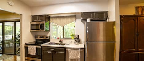 Fridge, microwave, stovetop, coffee/tea maker