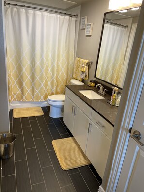 Combined shower/bathtub