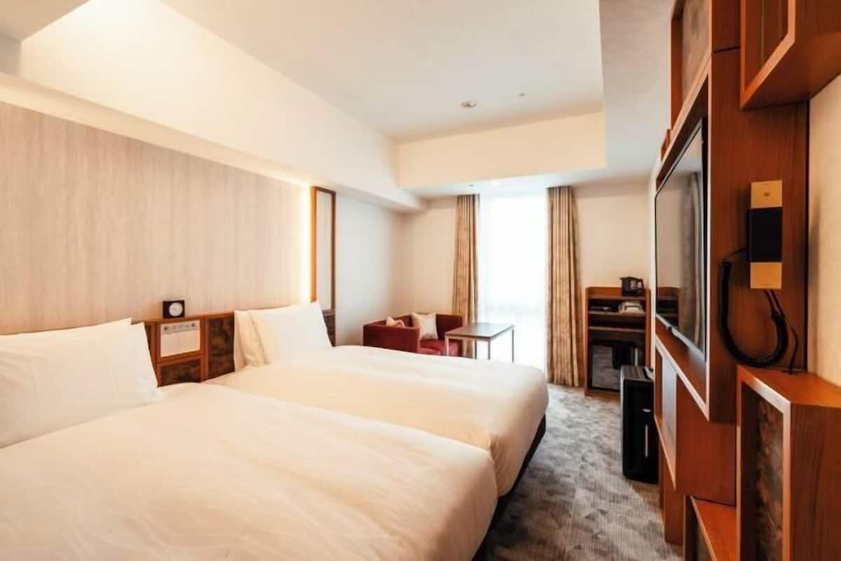 Down comforters, laptop workspace, blackout drapes, soundproofing