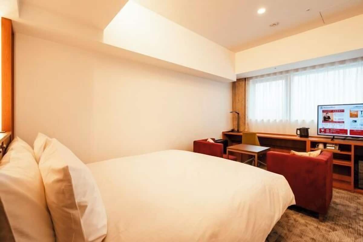 Down comforters, laptop workspace, blackout drapes, soundproofing