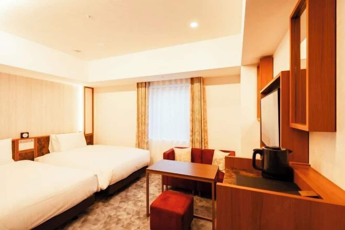 Down comforters, laptop workspace, blackout drapes, soundproofing