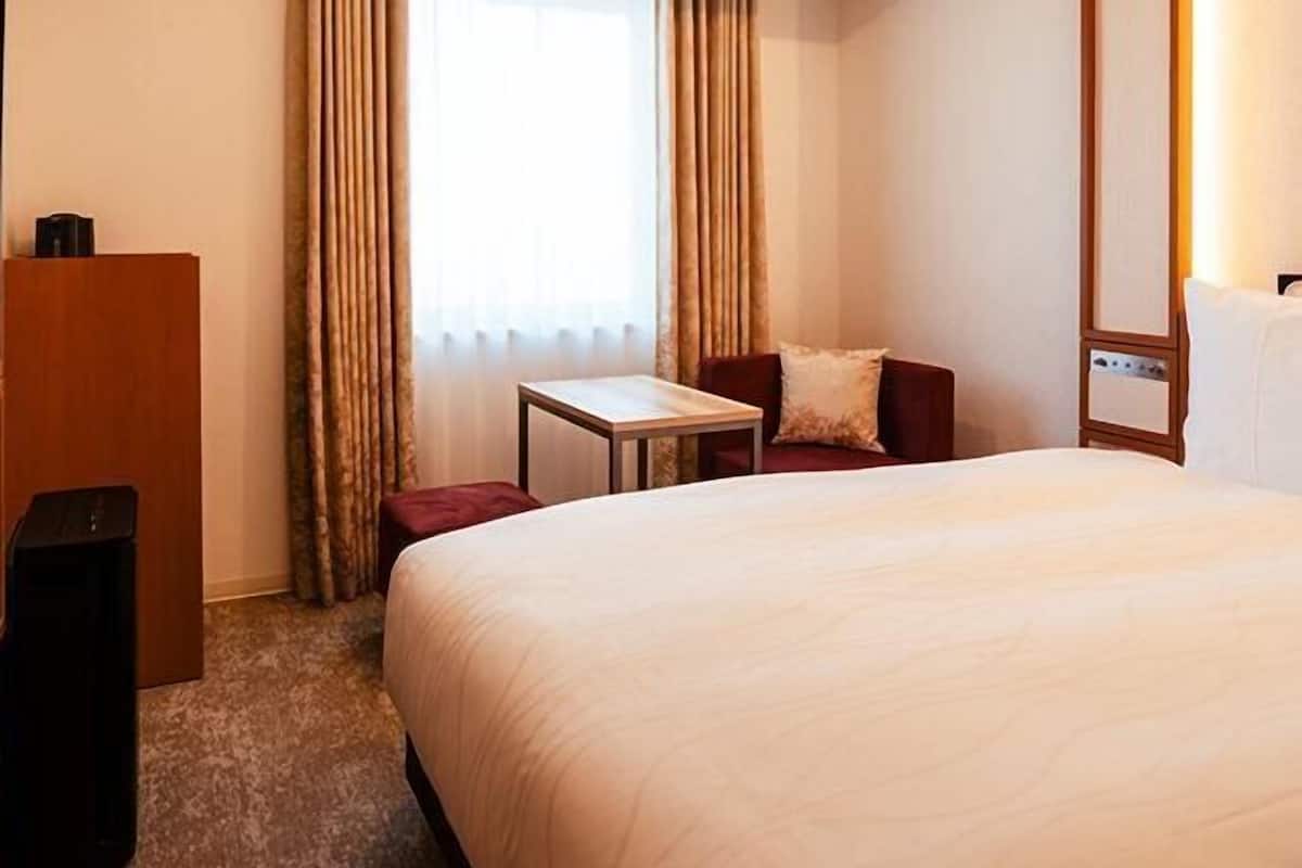 Down comforters, laptop workspace, blackout drapes, soundproofing